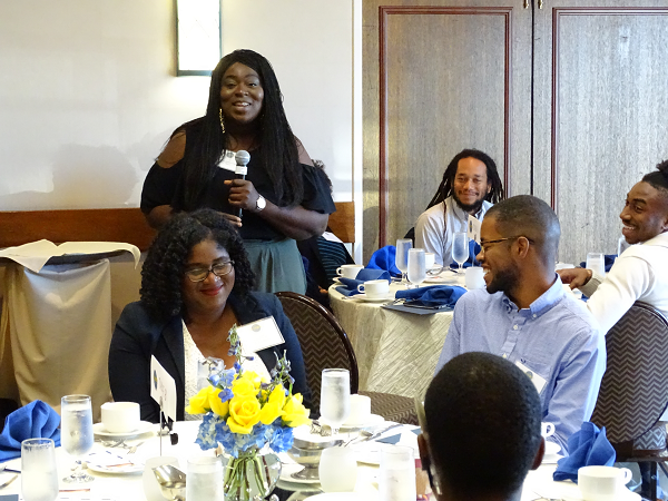 UC-HBCU Initiative fellows listen as one of their colleagues introduces himself